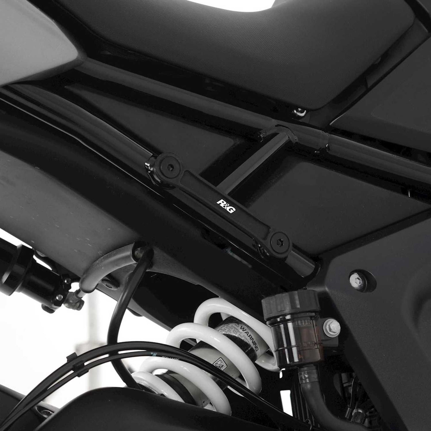 Placchette copri fori poggiapiedi posteriori (paio), Triumph Tiger 660 Sport '22-