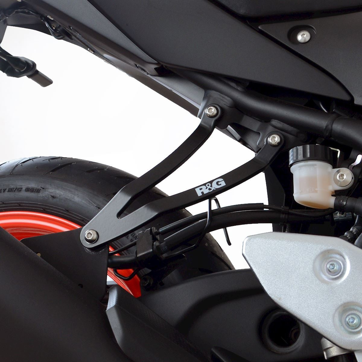 Staffa supporto scarico + piastra fori pedane posteriori, YAMAHA MT-25 / MT-03